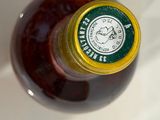 a bottle of wine that is sitting on a table