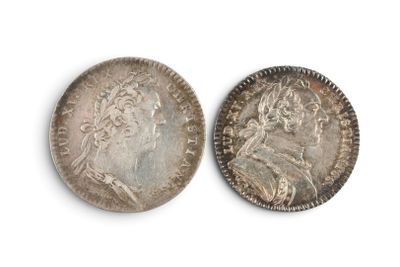 two silver coins, one of which has a bust and the other of which is a bust