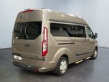 an image of a tan van parked in a room