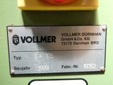 a close up of a sign on a machine that says vollmer