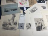 many different types of drawings on the table