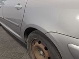 a car that has a flat tire on the side of the road