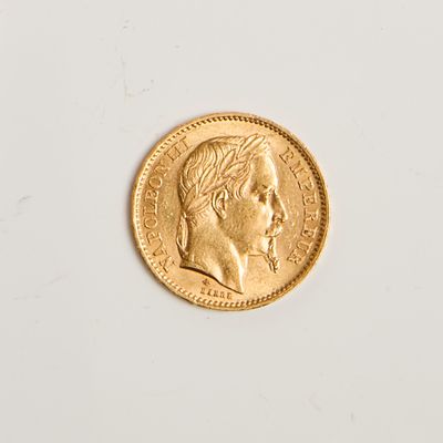 an image of a gold coin on a white surface