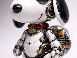 a white and black robot dog with sunglasses and a red collar