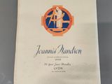 an old book with a picture of a man and a woman on it