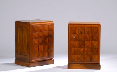 pair of bedside tables with drawers on each side and a drawer on the other side