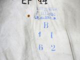 a close up of a white shirt with blue writing on it