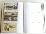 an open book with pictures of boats and people