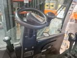 a close up view of a forklift in a warehouse