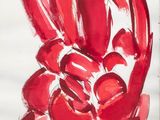 painting of a red flower on a piece of paper with a white background