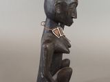 an image of a statue of a man with a hat on his head