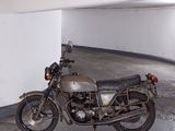 a motorcycle that is parked in a parking garage
