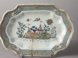 a plate with a picture of a castle on it
