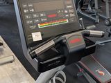 a tread machine in the middle of a gym