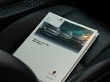 a book that is sitting on the seat of a car