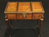 an antique writing table with two drawers and a drawer on the top