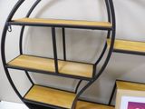 a picture of a book shelf with a picture on it