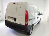 a white van that is parked in a white room