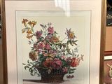 une photo d'une photo représentant un panier de fleurs exposé