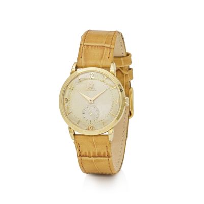 an image of a gold watch with a white dial and brown leather strap