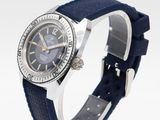 an image of a watch with a blue strap on a white background