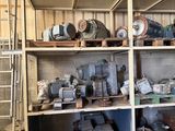 many different types of machinery on the shelves in the building
