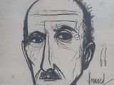 a drawing of a man with a mustache on a piece of paper