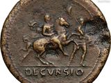 a close up of a coin with a horse and rider on it
