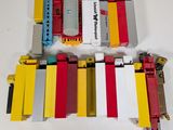 a lot of toy trains that are sitting on a table