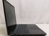 an open laptop computer sitting on top of a white surface