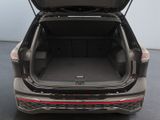 the back of a car with the trunk open and the seats folded down