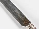 a knife that is sitting on top of a table