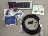 a keyboard, mouse, cables, and other electronics on the table