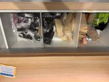 a display case filled with various items in a store