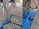 a machine that is sitting on a pallet in a warehouse