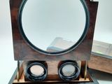 an image of a wooden box with a mirror on top of it