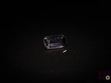 an image of a piece of glass in the dark