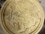 a yellow plate with a picture of a man on a horse drawn carriage