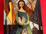 painting of a woman holding a baby on a plate on a red cloth