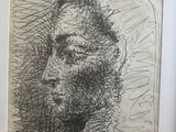 drawing of a man ' s face in a black and white frame