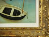 a picture of a painting of a boat in a gold frame