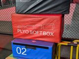 many boxes stacked on top of each other in a cage