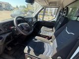 the interior of a truck with the driver ' s seat folded down