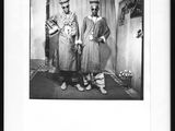 black and white photograph of two women standing next to each other