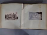 an open book with a picture of a building on it