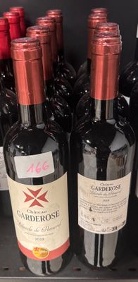 several bottles of wine are on display in a store
