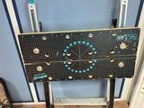 a table that has a clock on it in a room