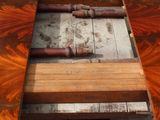 a wooden table with a drawer underneath it