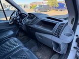 a view of the inside of a van from the driver ' s seat