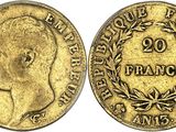a gold coin with an image of a man ' s face on it